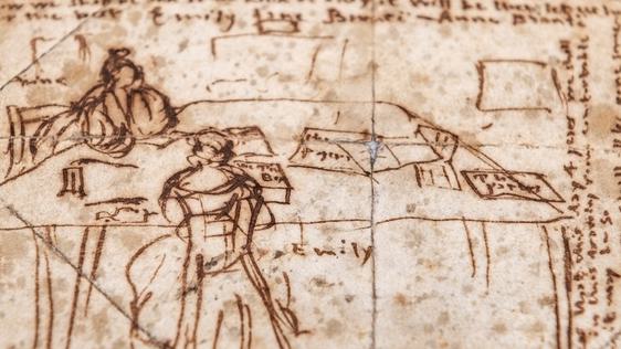 Photo of Emily's diary paper showing an illustration of Emily and Anne sat at the Dining table writing.