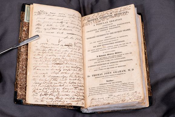 Photo of Patrick Brontë's copy of Domestic Medicine with his annotations in.