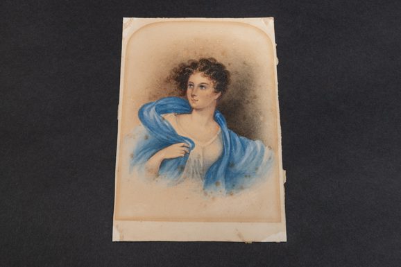 Watercolour painting of a woman with brown curly hair and a bright blue cloak.