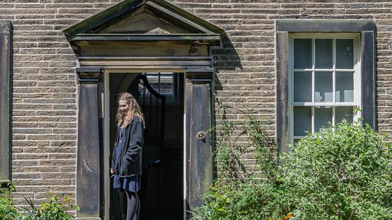 Photo of the open front door of the Bronte Parsonage Museum.
